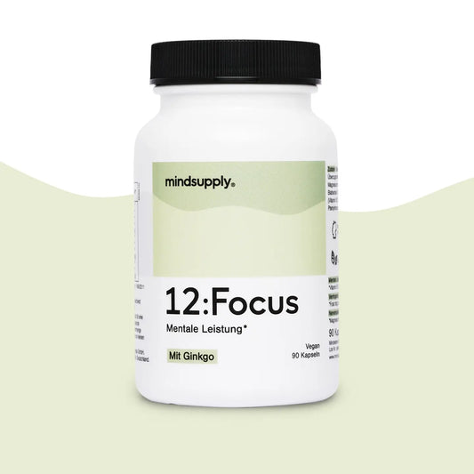 Focus supplement dose in grün mit Beschriftung in grün vor grün weißen Hintergrund