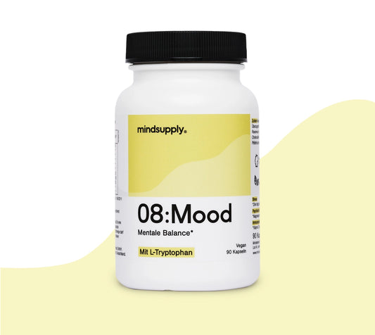 Mood supplement dose vor weißem / gelben Hintergrund 