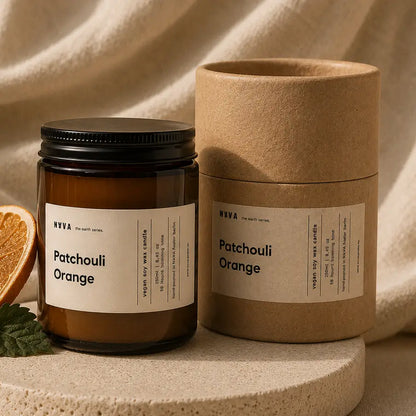 Sojakerze Patchouli Orange mit Verpackung und Orangenscheibe